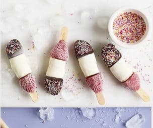 Banana lollipops with chocolate and sprinkles