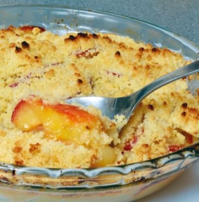 fruit crumble in a glass bowl.