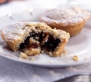 Home made mince pies on a white plate